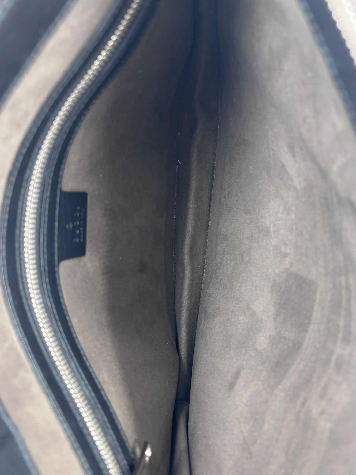 Gucci pochette GG cuir embossé