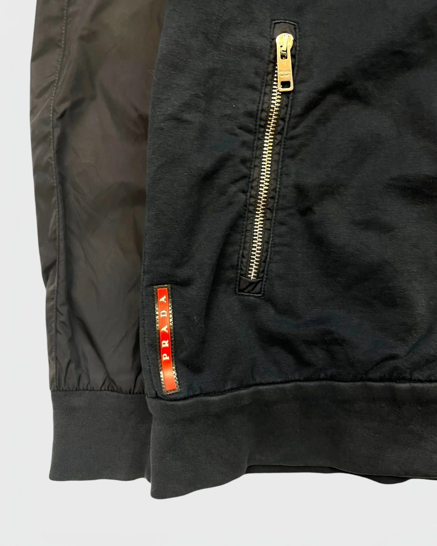 Prada veste bi-matiére