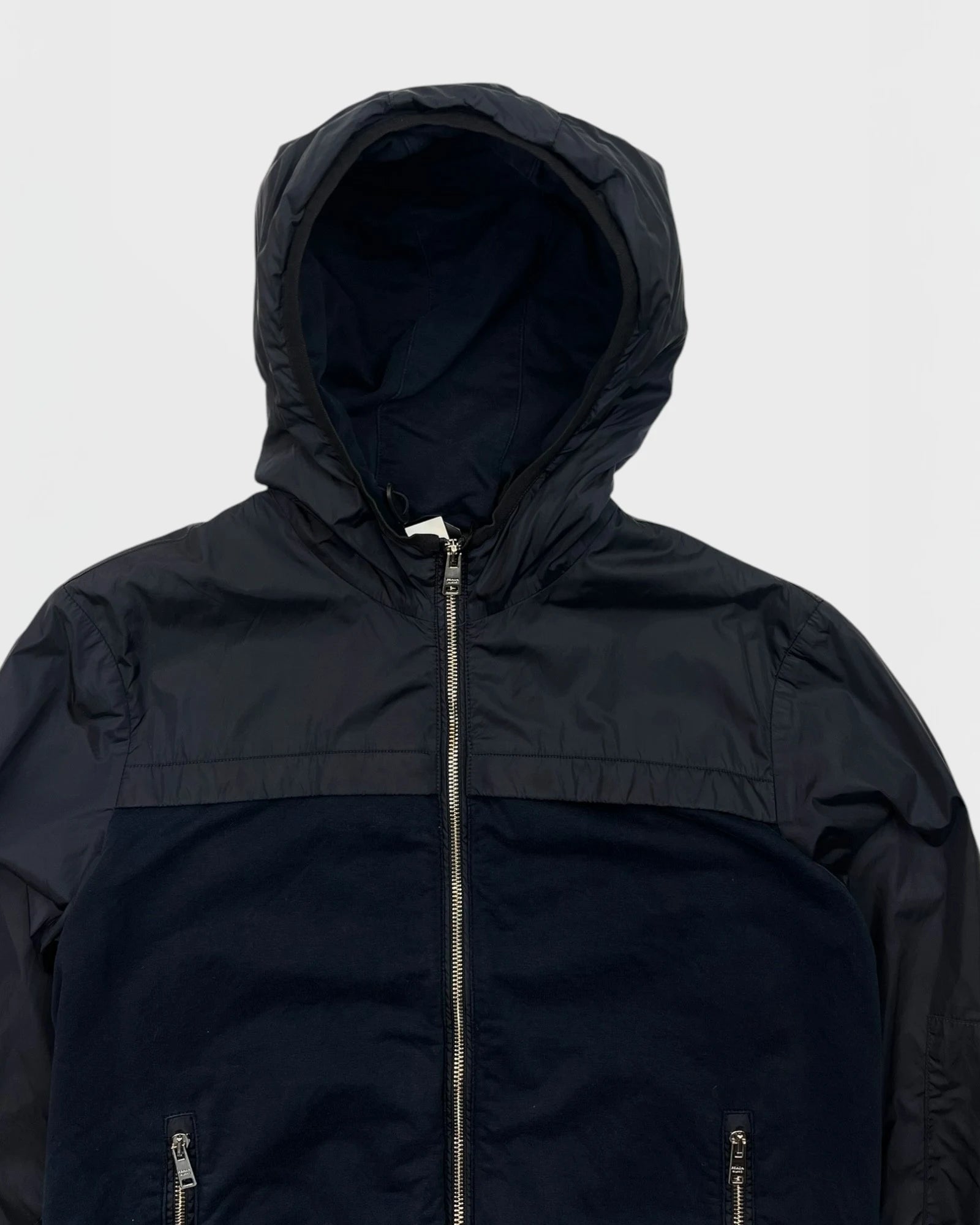 Prada veste bi-matiére