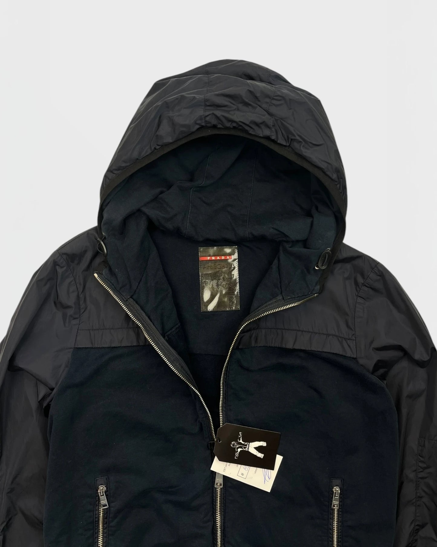 Prada veste bi-matiére