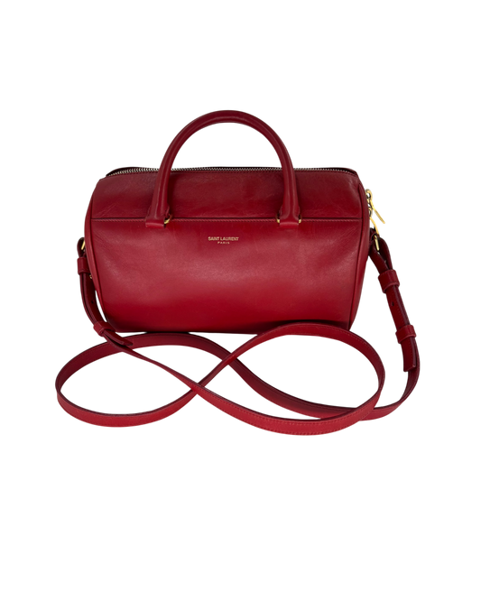 Saint Laurent Sac à main Baby Duffle en cuir rouge