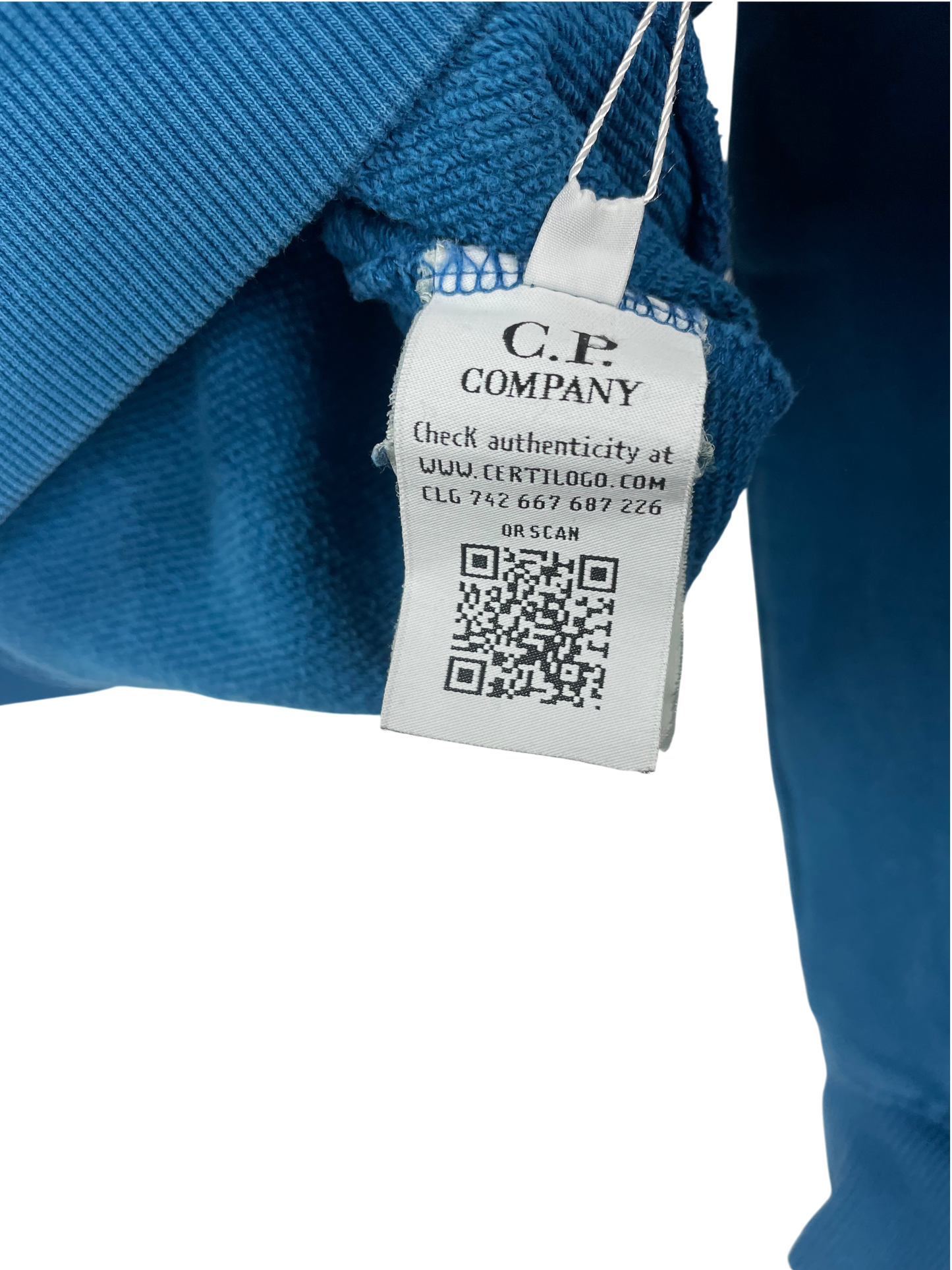 C.P. Company pull avec lentille
