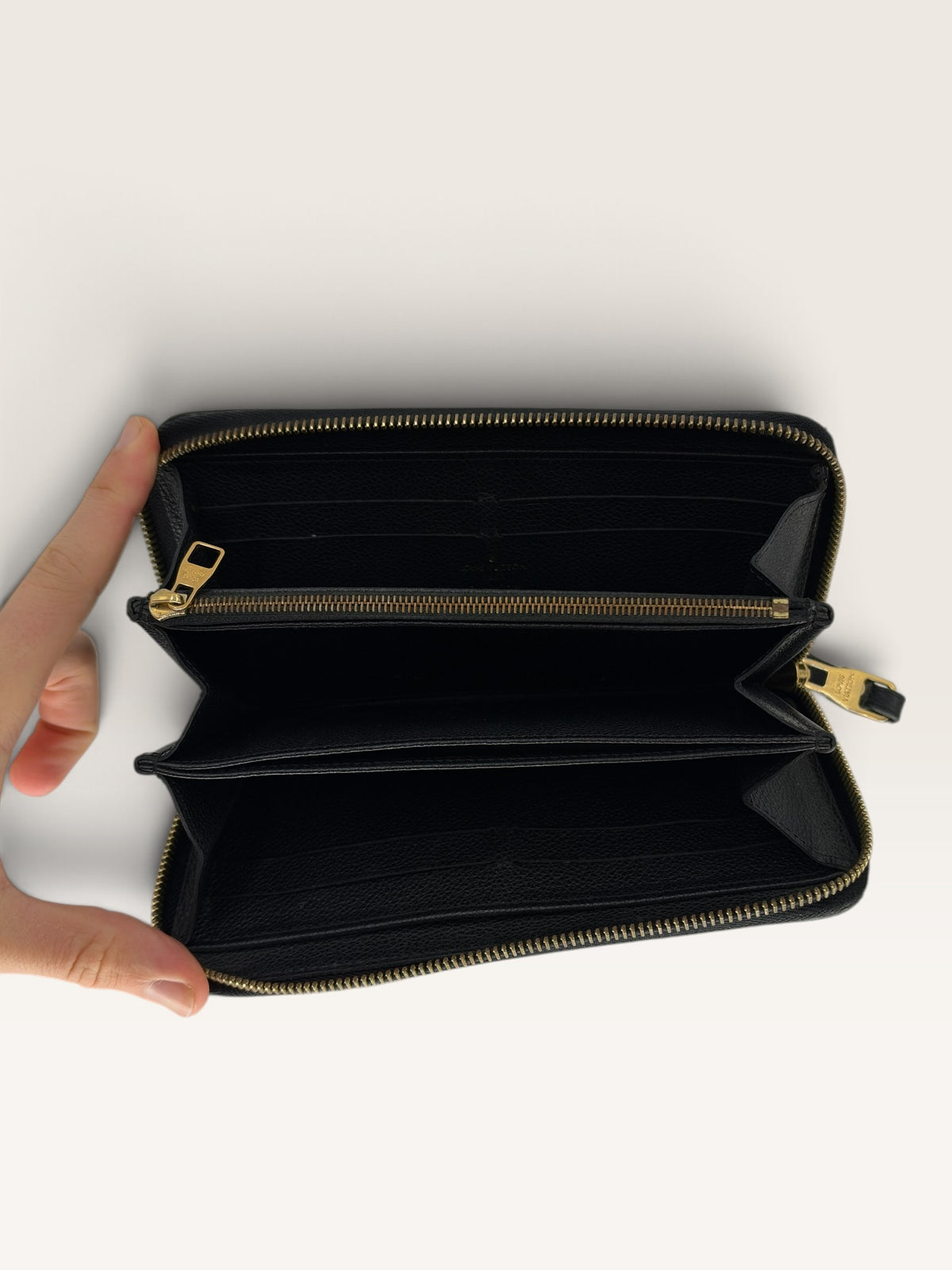 Louis Vuitton Portefeuille Zippy Empreinte